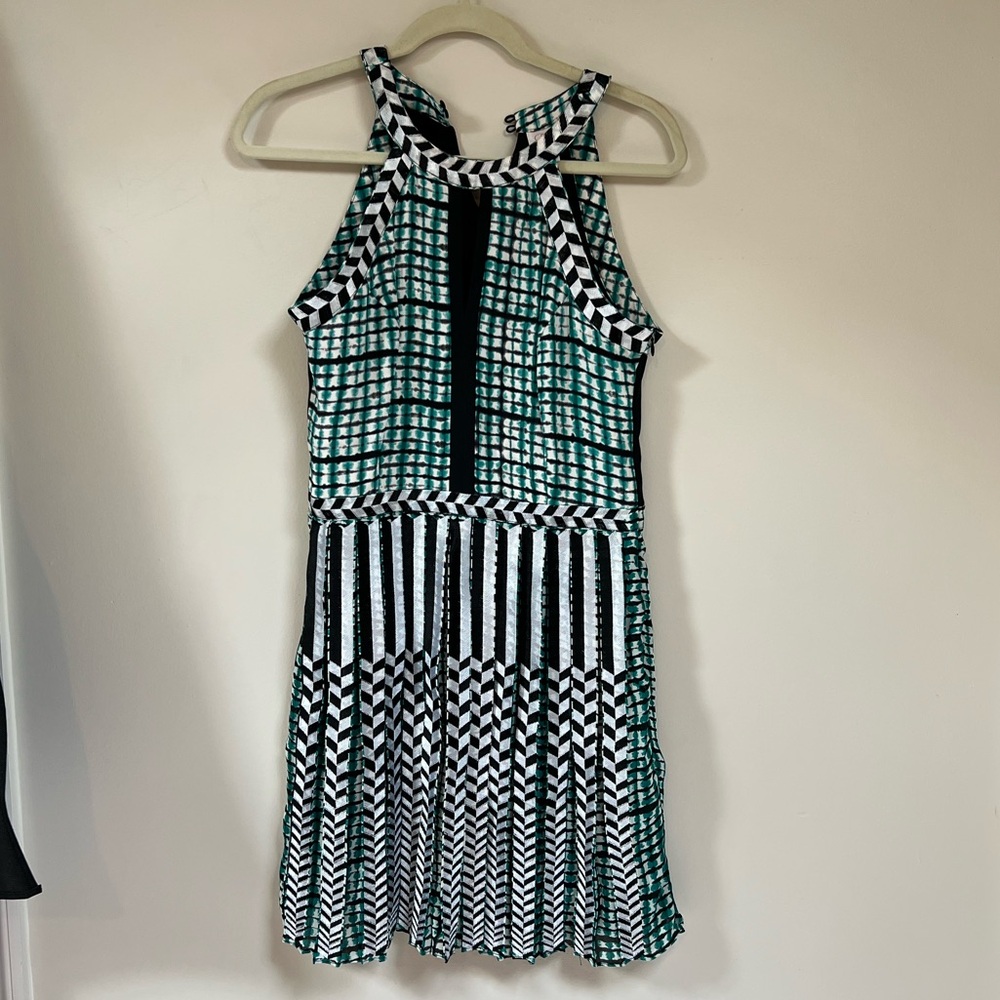LAST CHANCE 🚨 Parker fit and flare green patterned, pleated dress. Never worn!